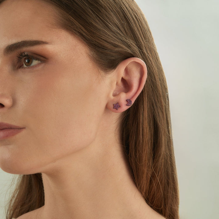 ASYMMETRISCHE OORBELLEN AMRITA
